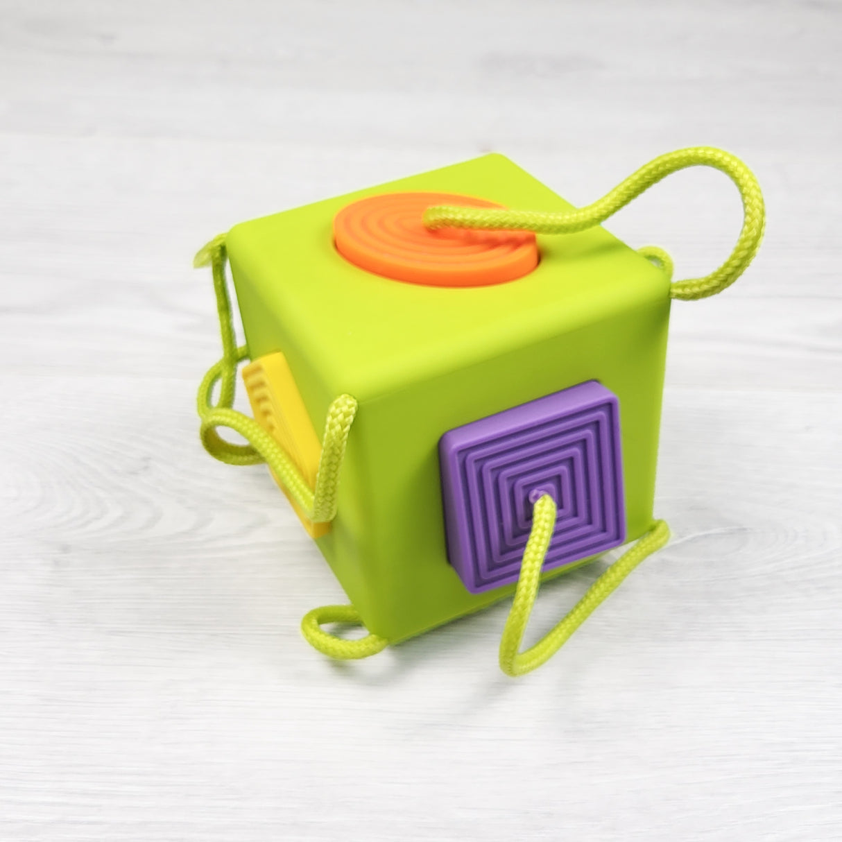 Fat Brain Toys "OombeeCube" silicone shape sorting toy