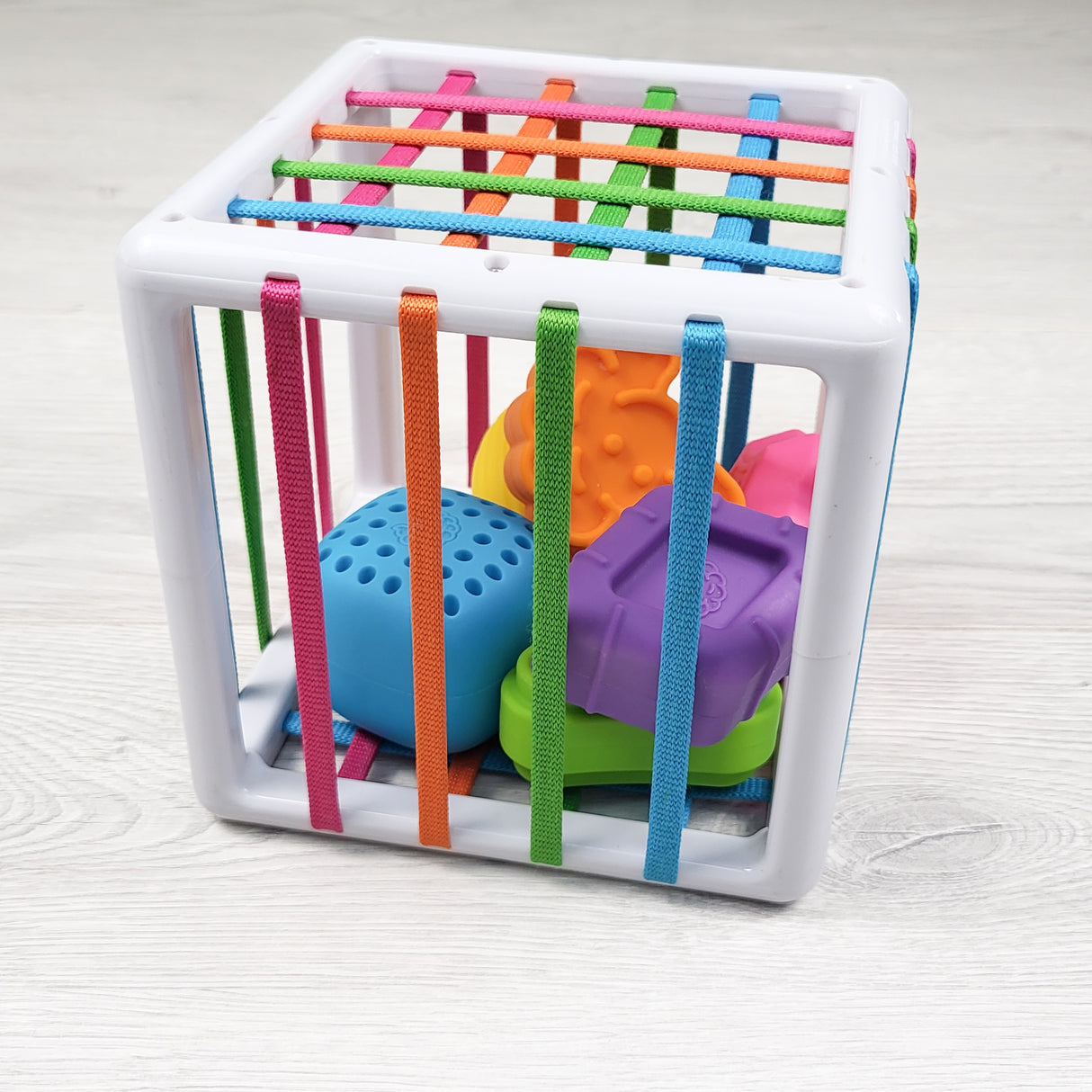 Fat Brain Toys "InnyBin" shape sorting cube