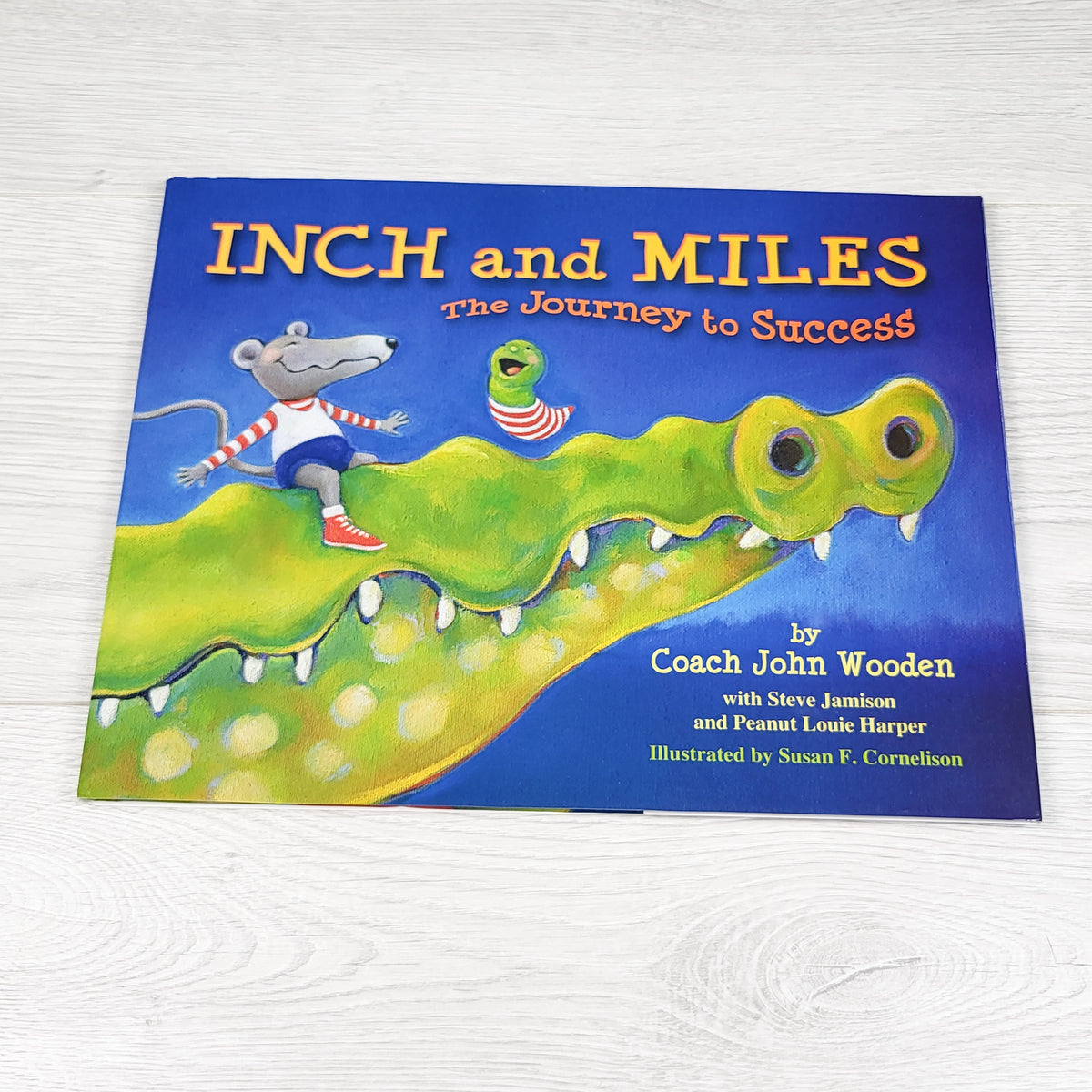 Inch and Miles: The Journey to Success. Hardcover book