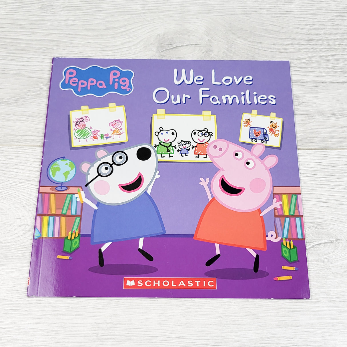 Peppa Pig: We Love Our Families. Soft cover book