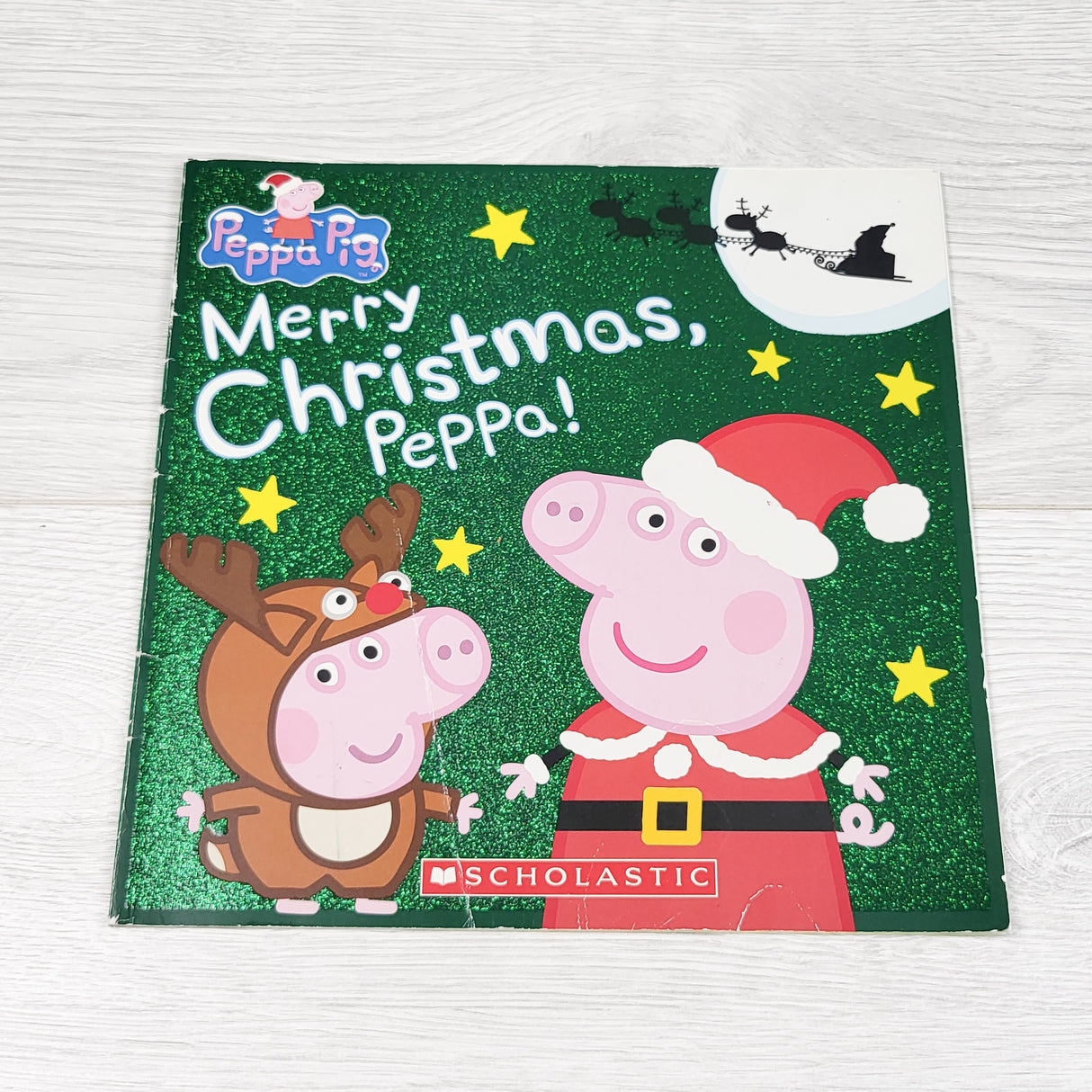 Merry Christmas Peppa. Soft cover book
