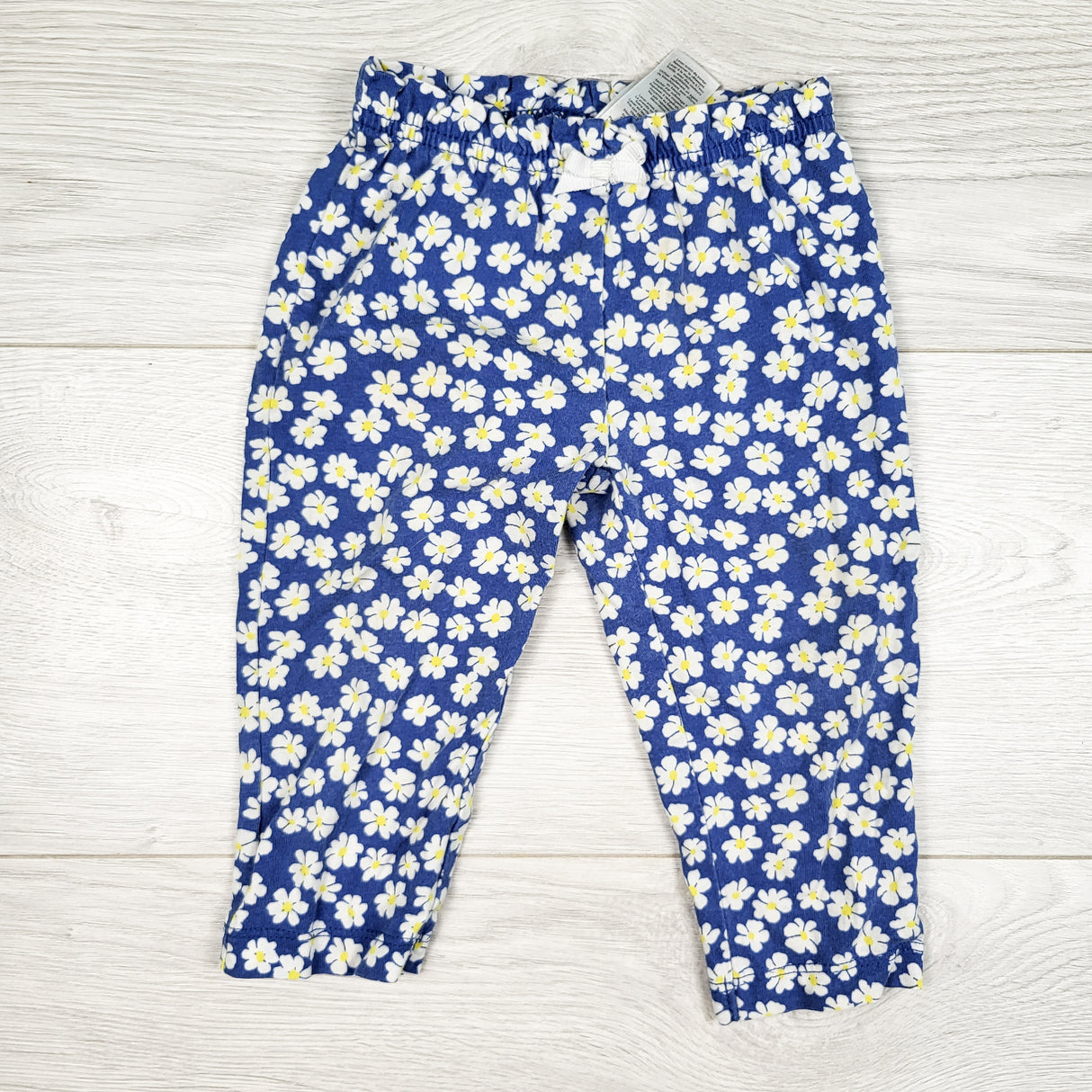 Carters blue cotton pants with daisies. Size 9 months