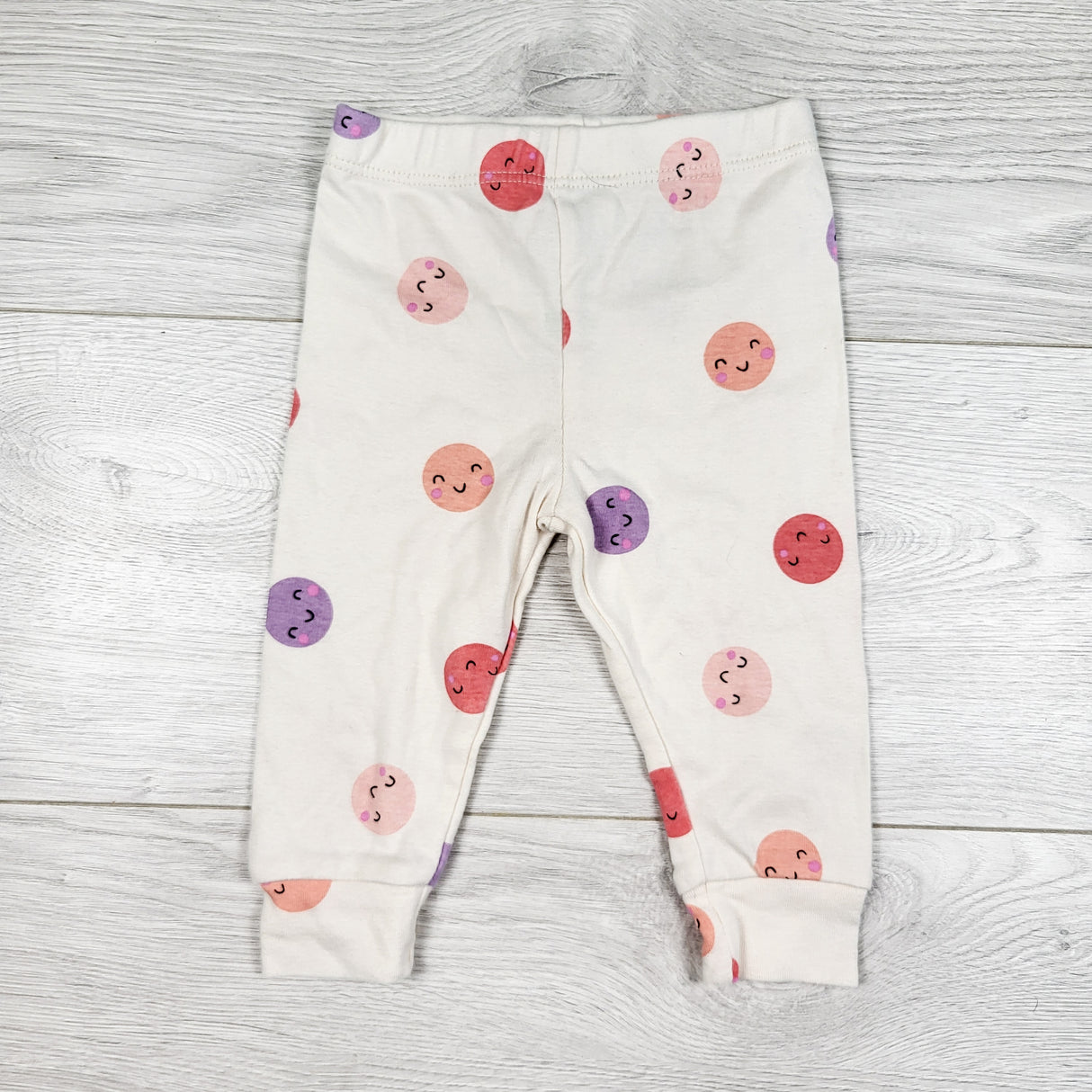 Pekkle cream coloured leggings with moons. Size 6 months