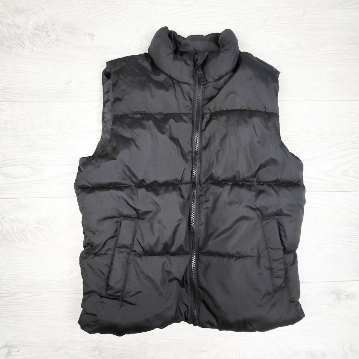 Old Navy black puffer vest. Size 8