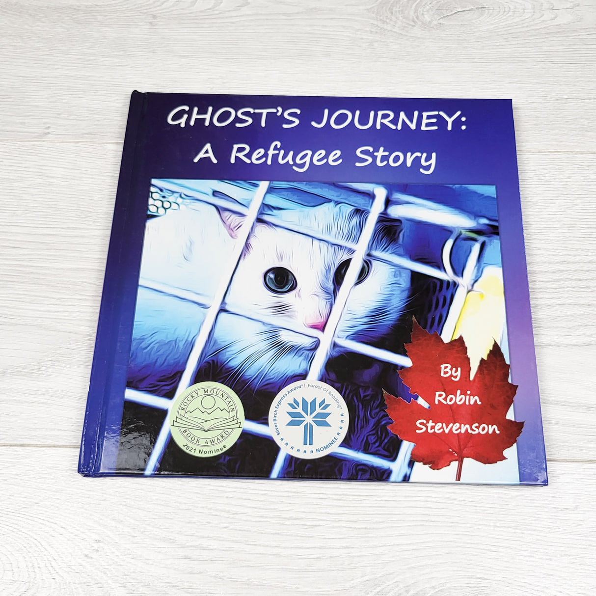 Ghost's Journey: A Refugee Story. Hardcover book