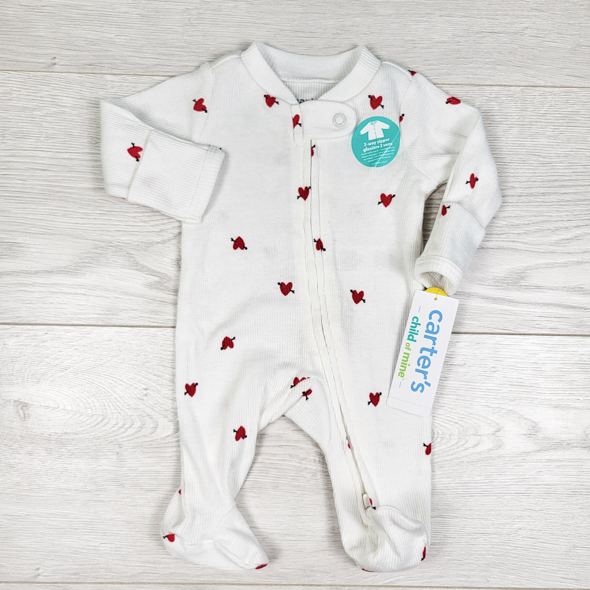 NEW - Child of Mine white ribbed cotton sleeper with hearts. PREEMIE size