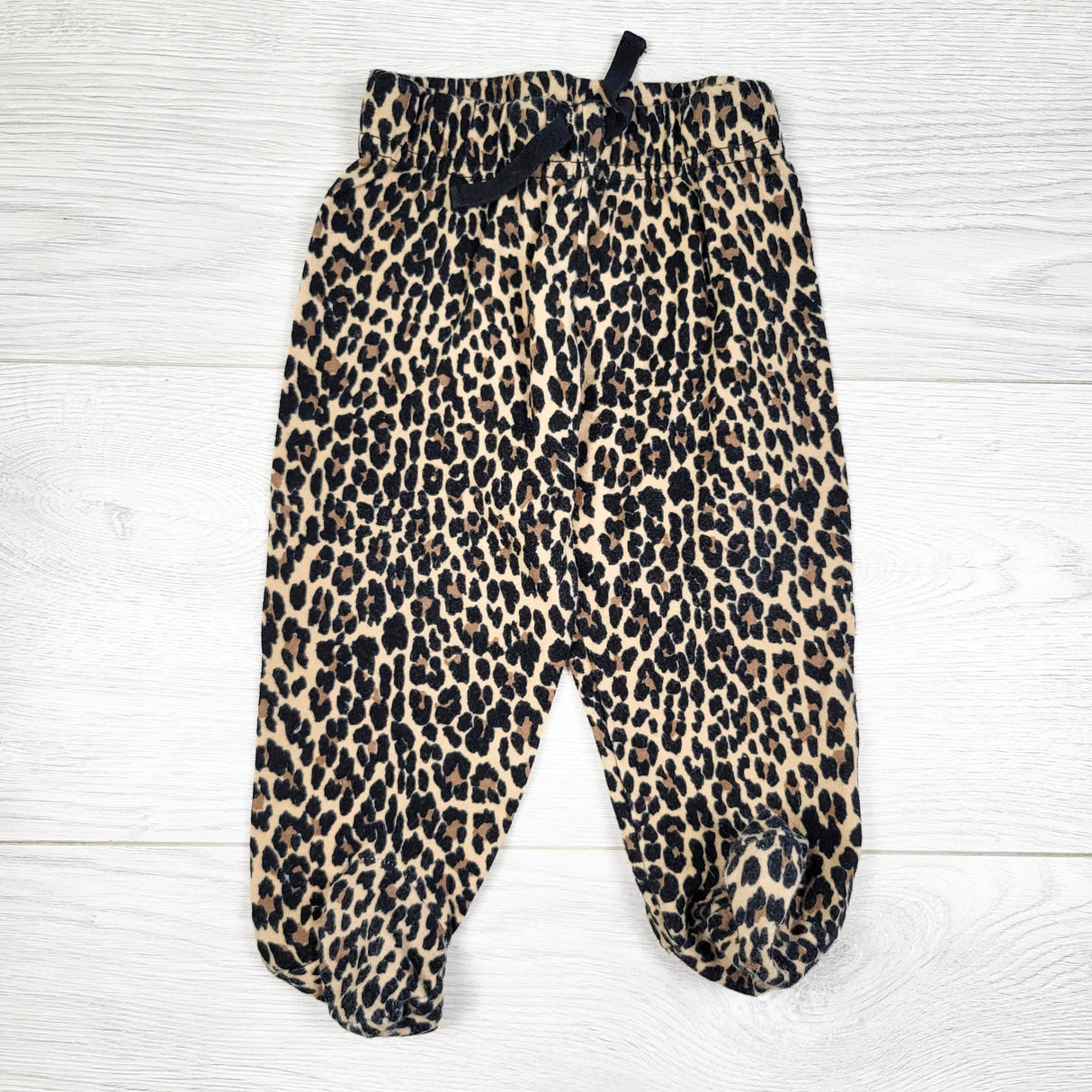 George tan leopard print footed pants. Size 6-9 months