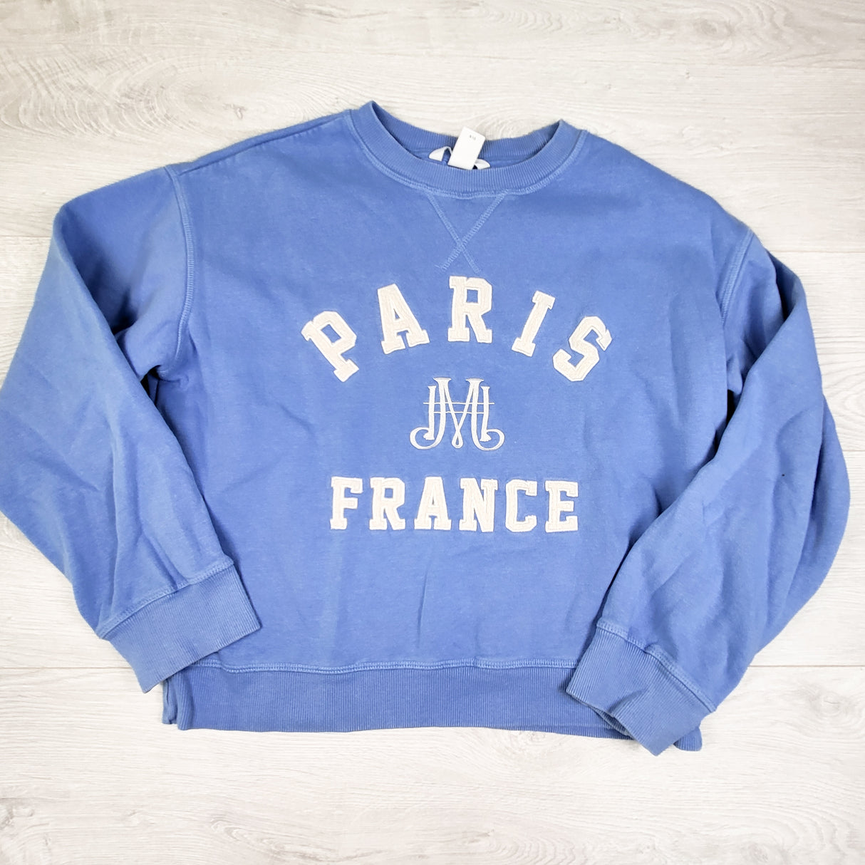 H and M blue cropped fleecy lined "Paris" sweatshirt. ADULT XS