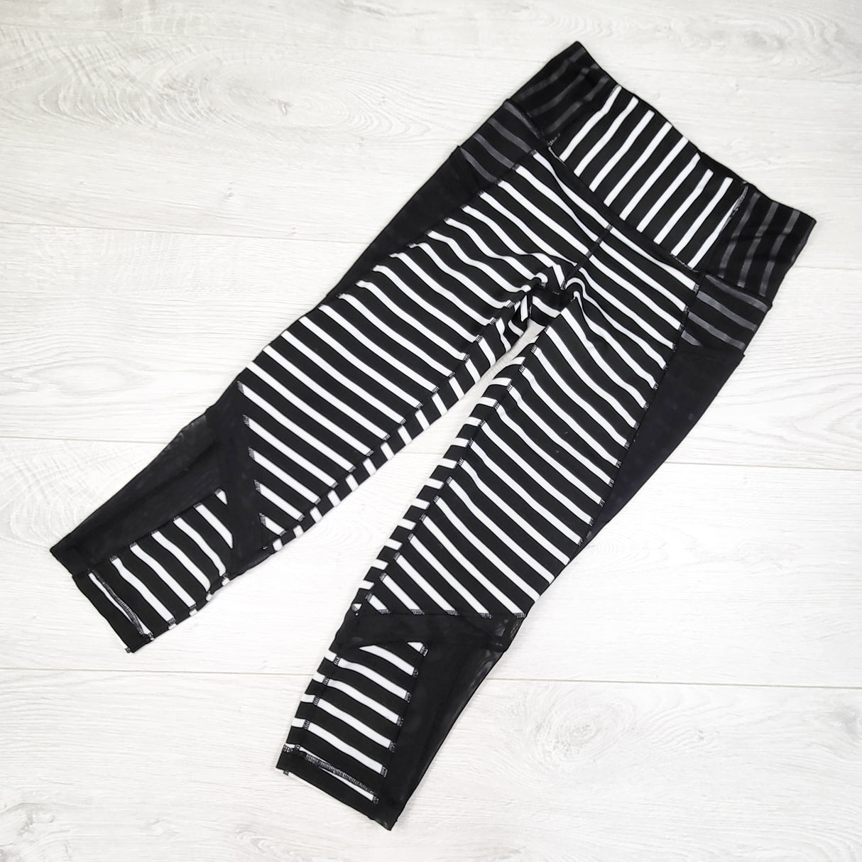 Ivivva by Lululemon cropped striped active leggings. Size 12