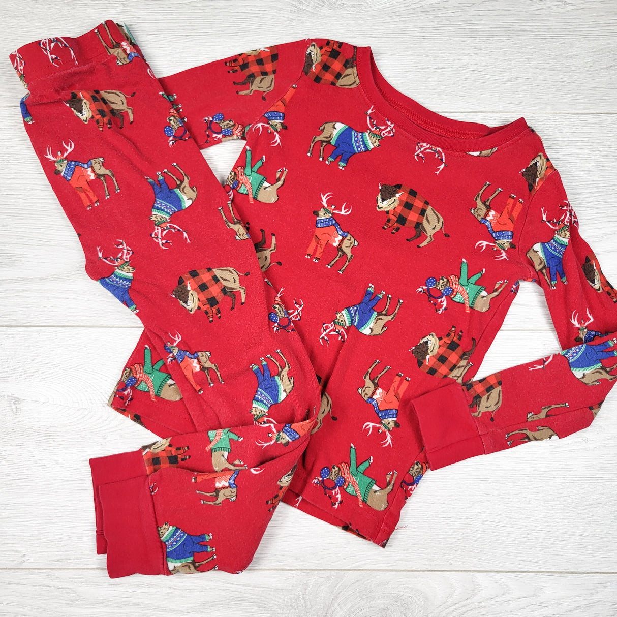 Old Navy red 2pc PJs with holiday animals. Size 5T