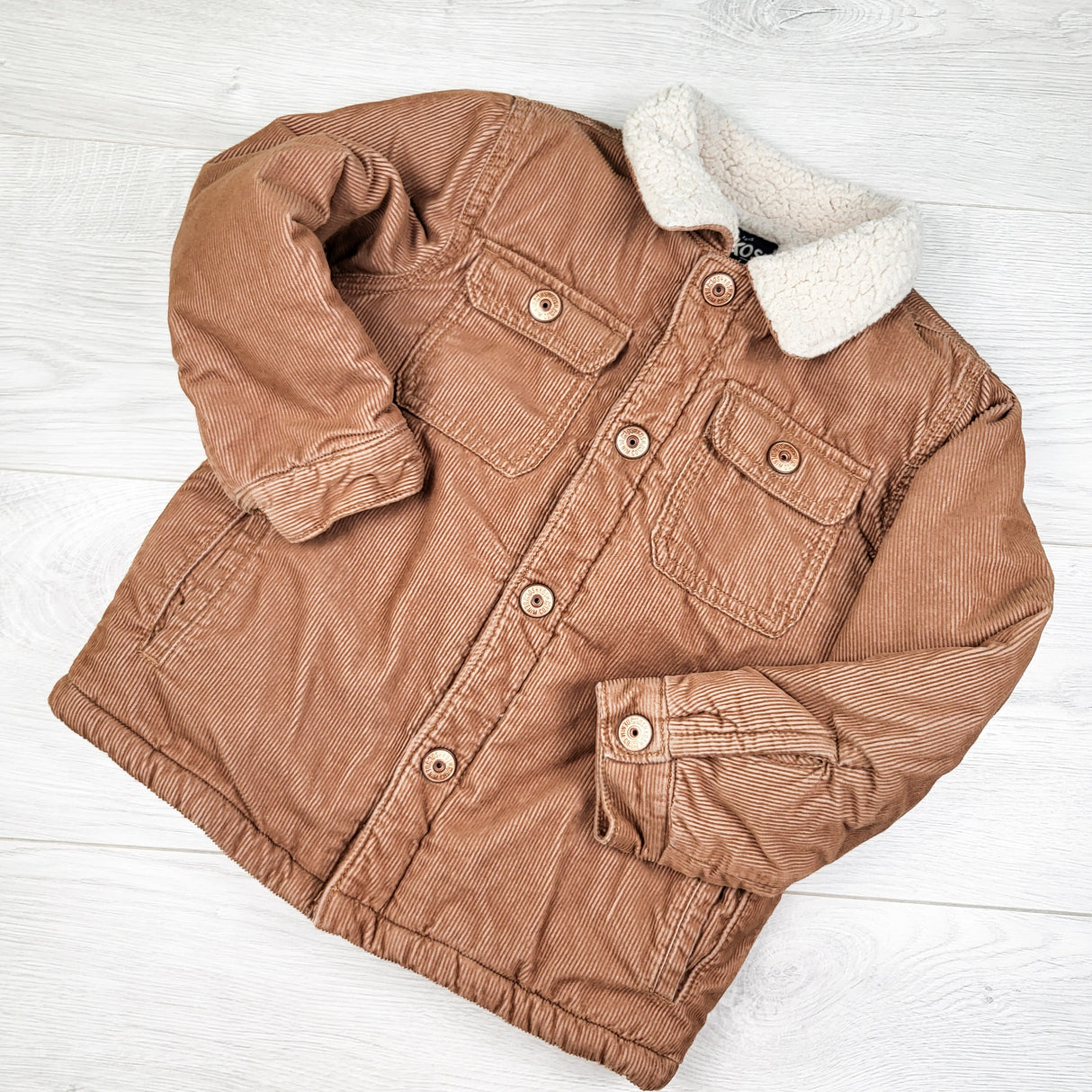 Oshkosh brown sherpa lined corduroy jacket. Size 5T