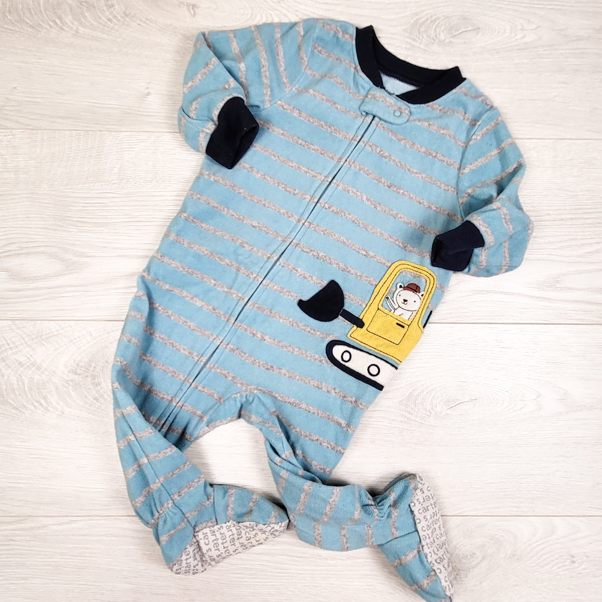 Carters blue striped zippered fleece sleeper with digger. Size 9 months