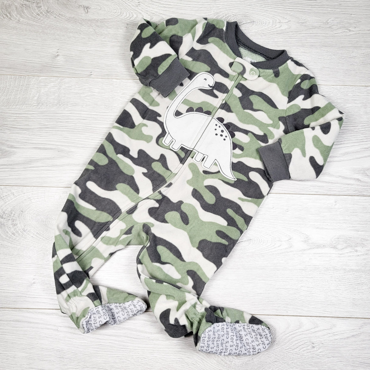 Carters camouflage zippered fleece sleeper with dinosaur. Size 9 months