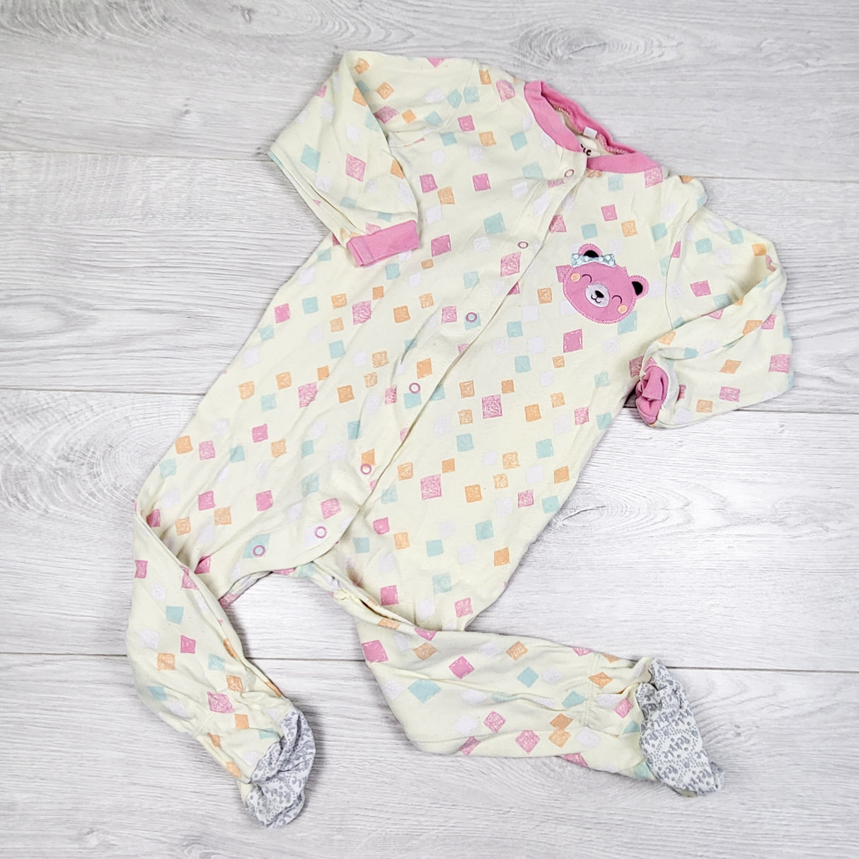 Pekkle yellow sleeper with blocks and bear. Size 18 months