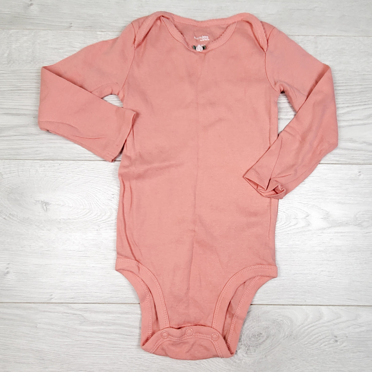 Simple Joys pinky-coral long sleeve bodysuit. Size 24 months