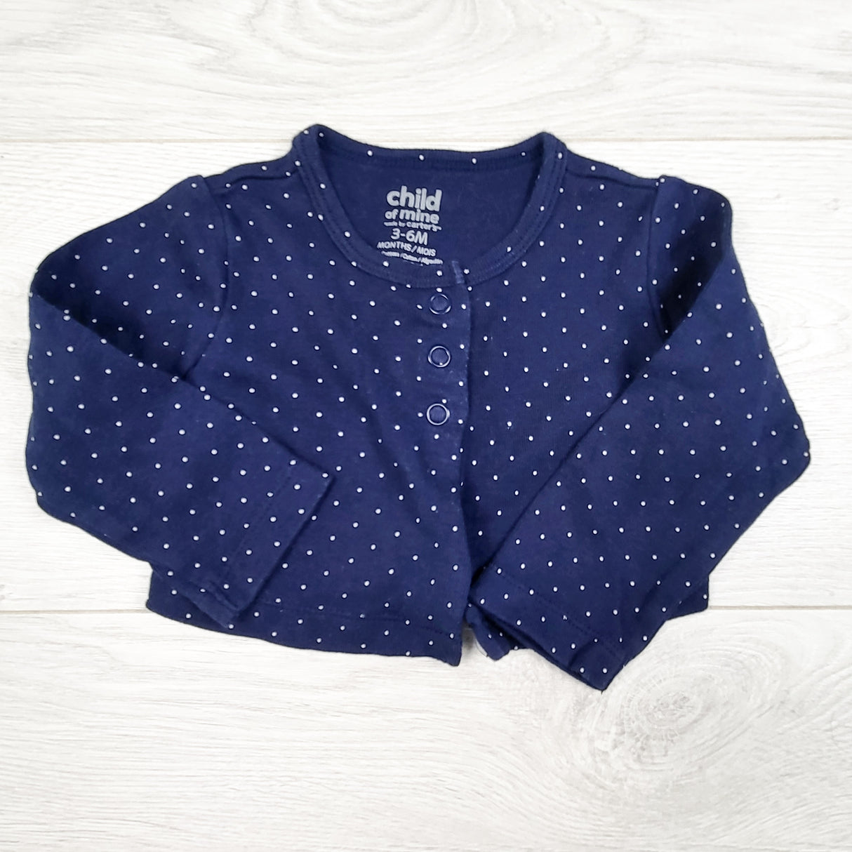 Child of Mine navy polka dot snap button top. Size 3-6 months
