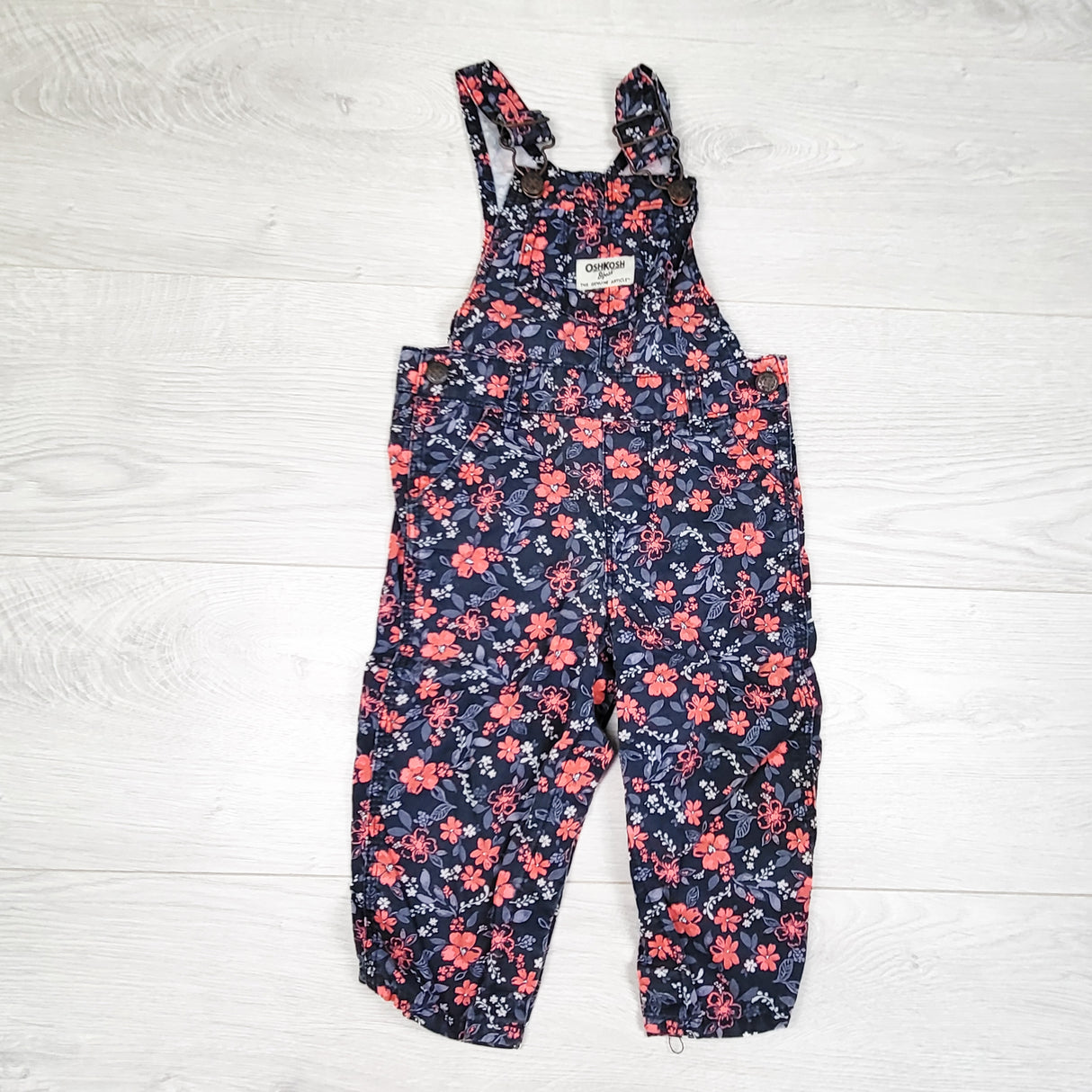 Oshkosh navy floral print overalls. Size 12 months