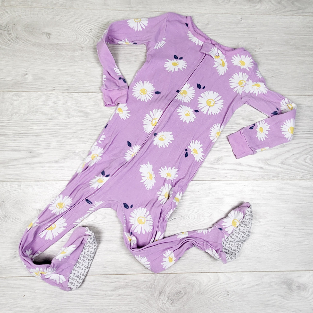 Carters purple floral print zippered sleeper. Size 2T