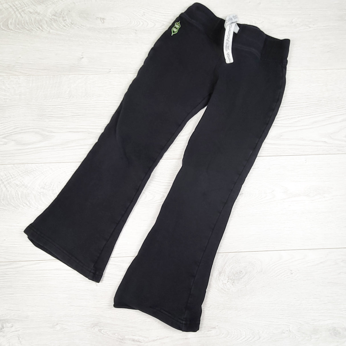 Peekaboo Beans black flare leg joggers. Size 6