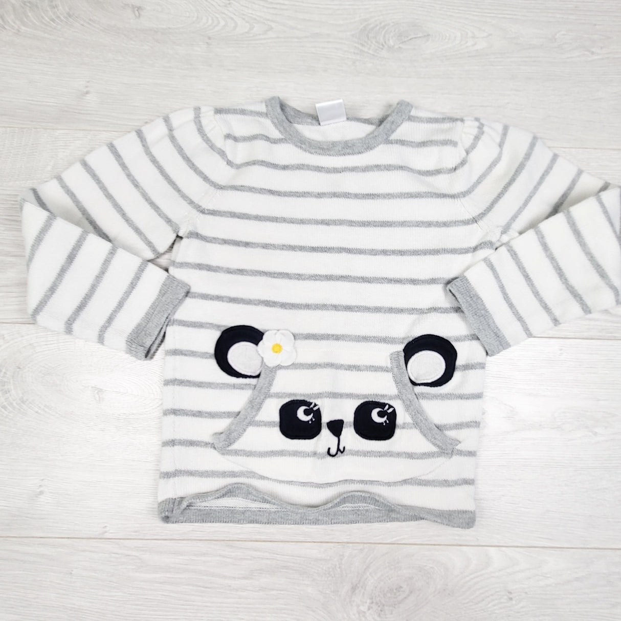 Gymboree white and grey striped sweater with pands. Size 4T