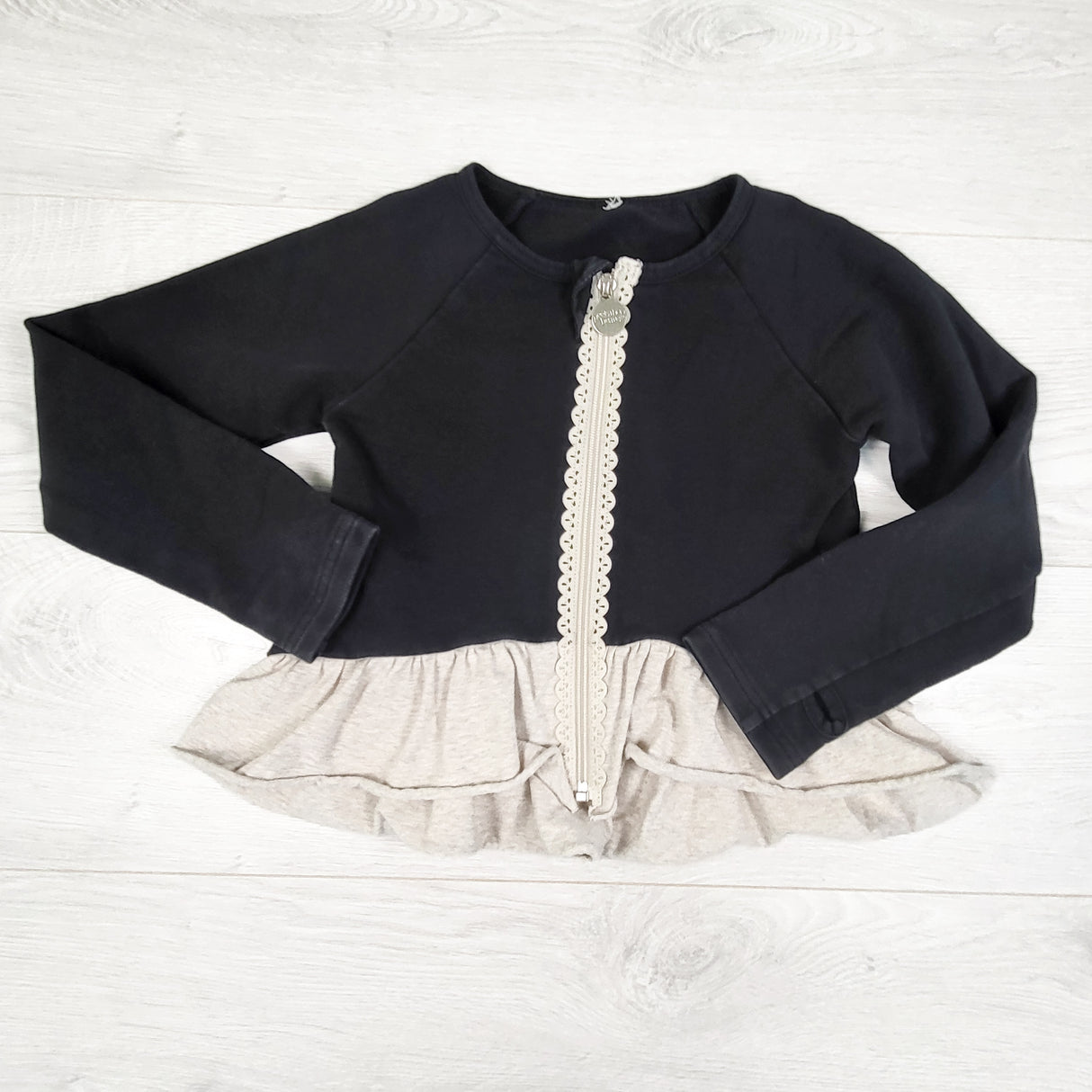 Peekaboo Beans black and beige zip-up peplum top. Size 5T