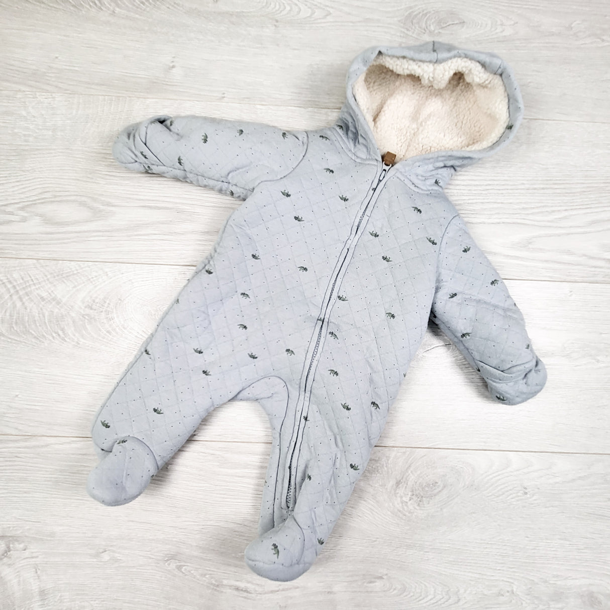 Carters blue quilted sherpa lined bunting suit with dinosaurs. Newbon size