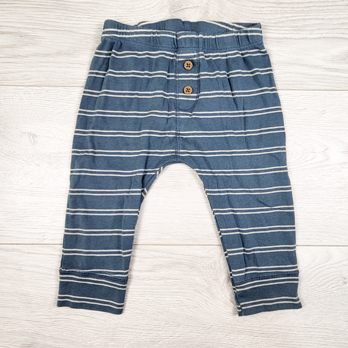 Carters blue striped pants with buttons. Size 9 months