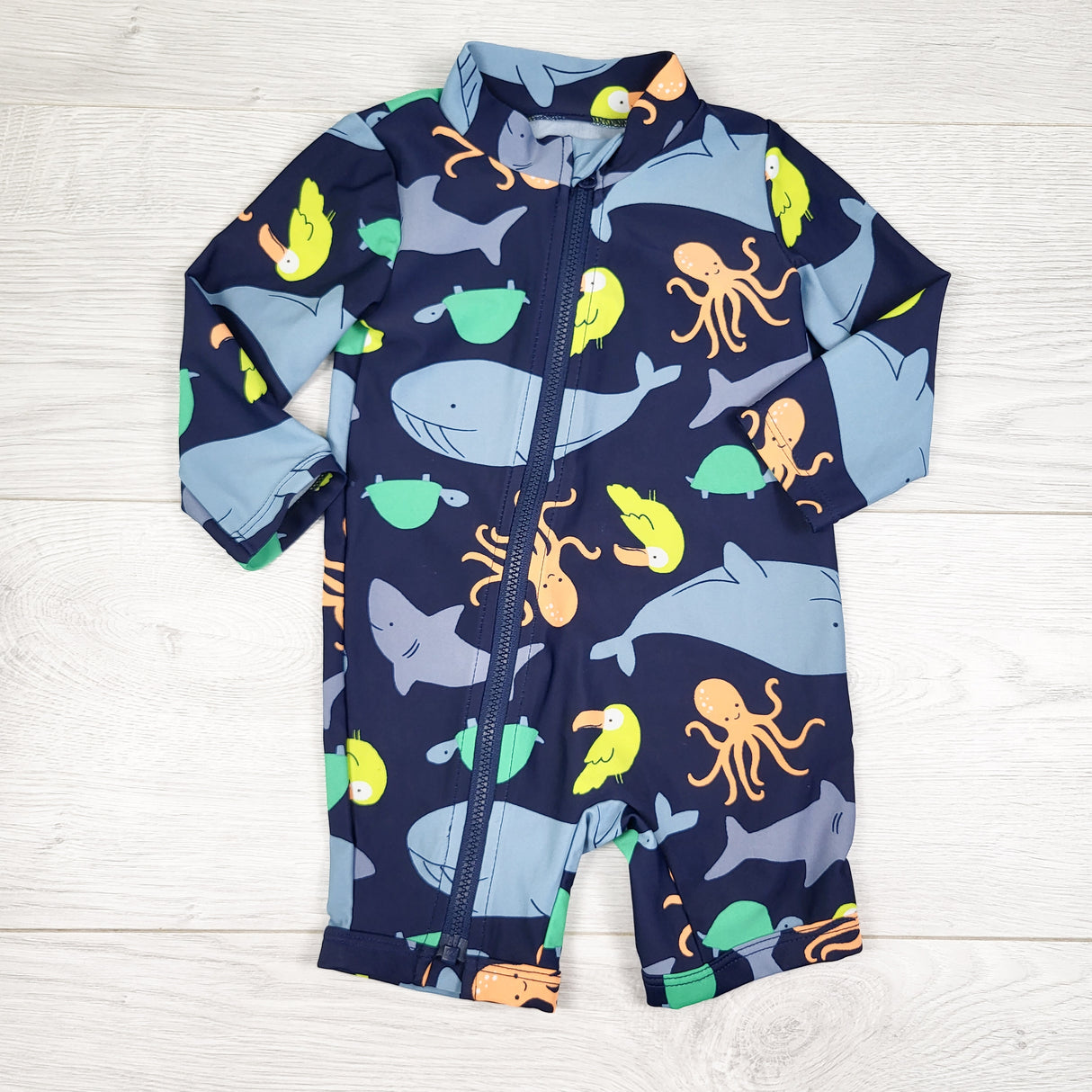 Simple Joys navy one piece rash guard with sea creatures. Size 3-6 months