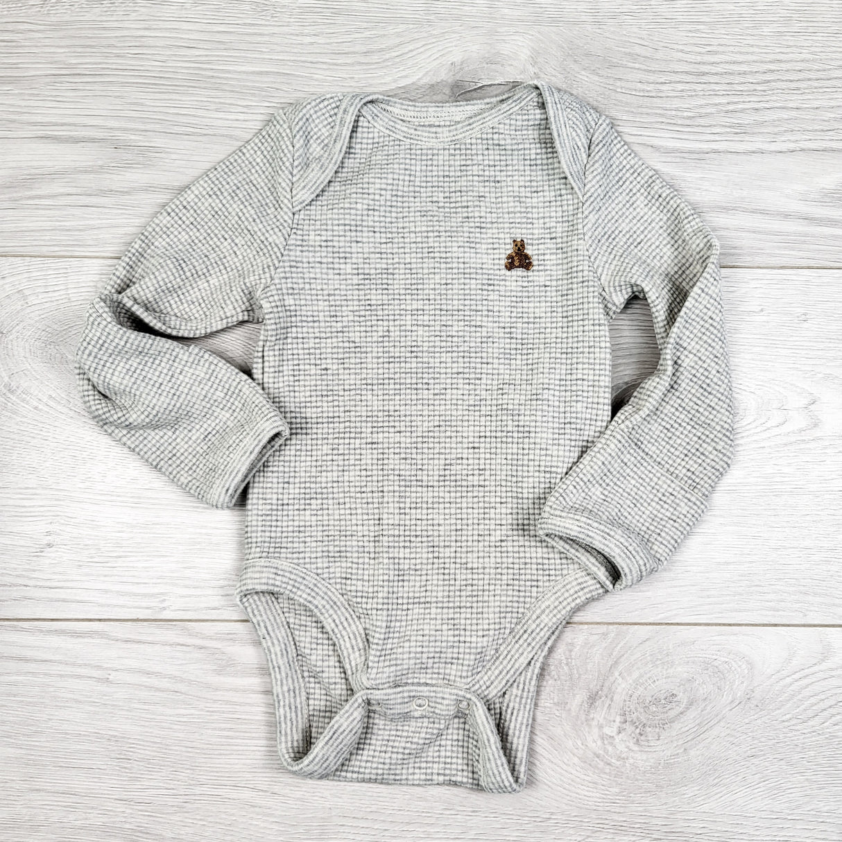 Gap grey waffled long sleeve bodysuit. Size 3-6 months