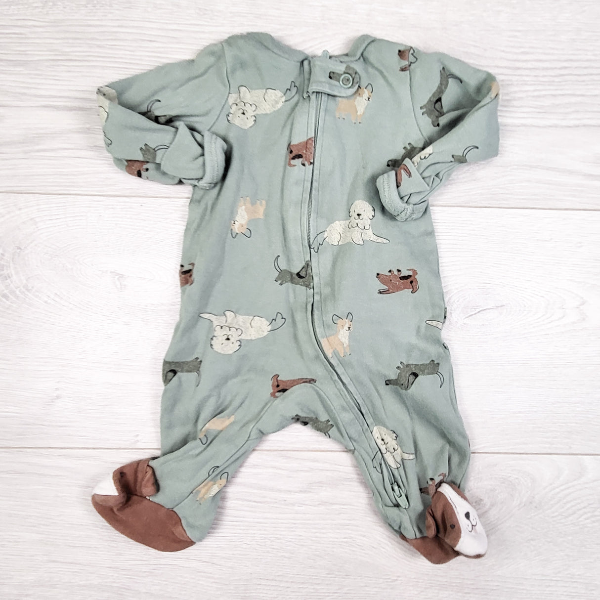 Carters green zippered cotton sleeper with dogs. Newborn size