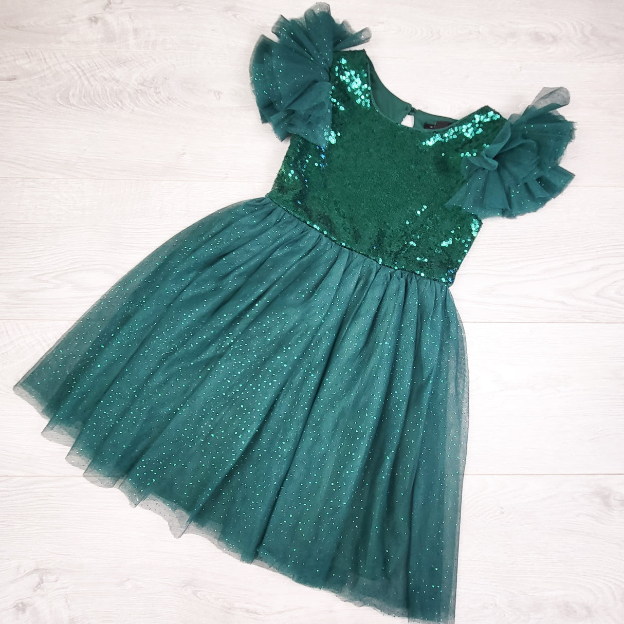 Zunie green tulle special occasion dress with sequins. Size 6