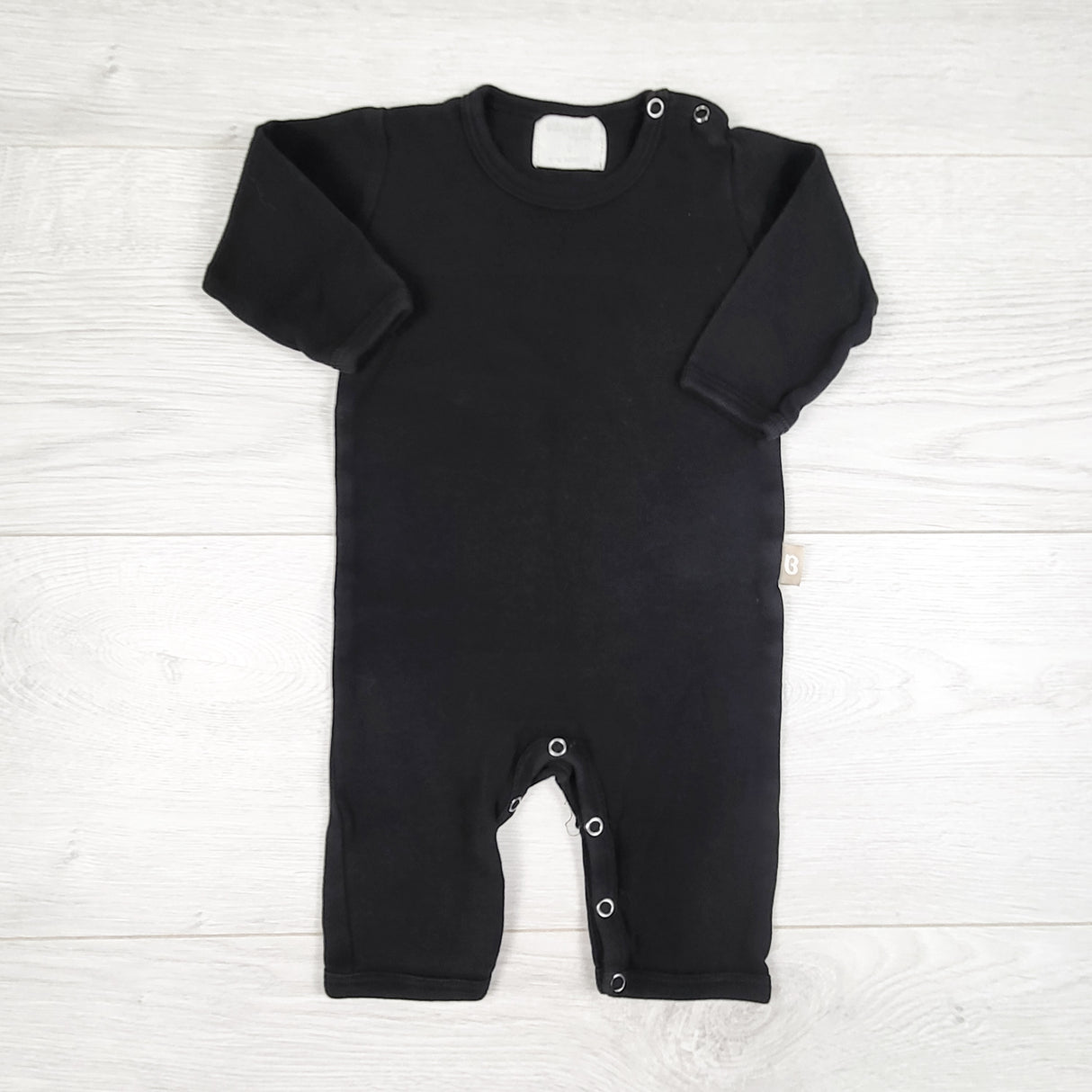 Babyushka black organic cotton romper. Size 6-12 months