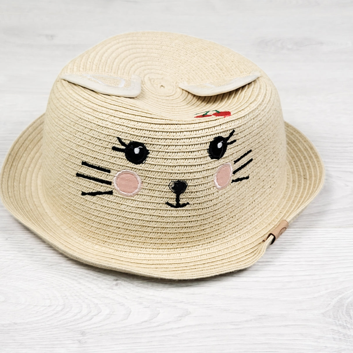 Flapjack Kids packable straw hat with cat face. Size 2-4 Years