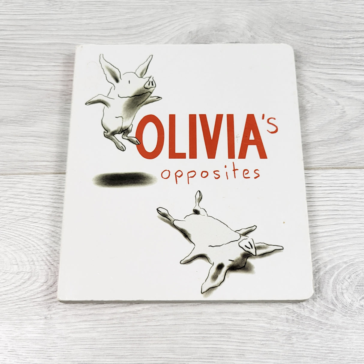 Olivia's Opposites. Board book