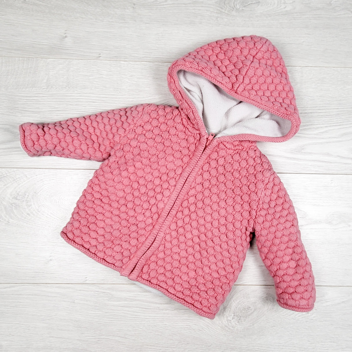 Joe pink textured knit hoodie with fleece lining. Size 12-18 months