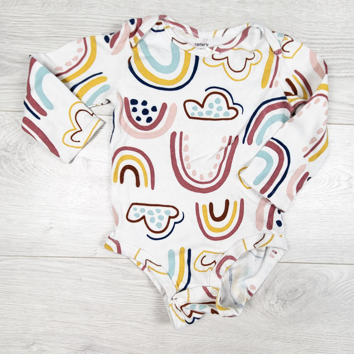 Carters white bodysuit with rainbows and clouds. Size 18 months