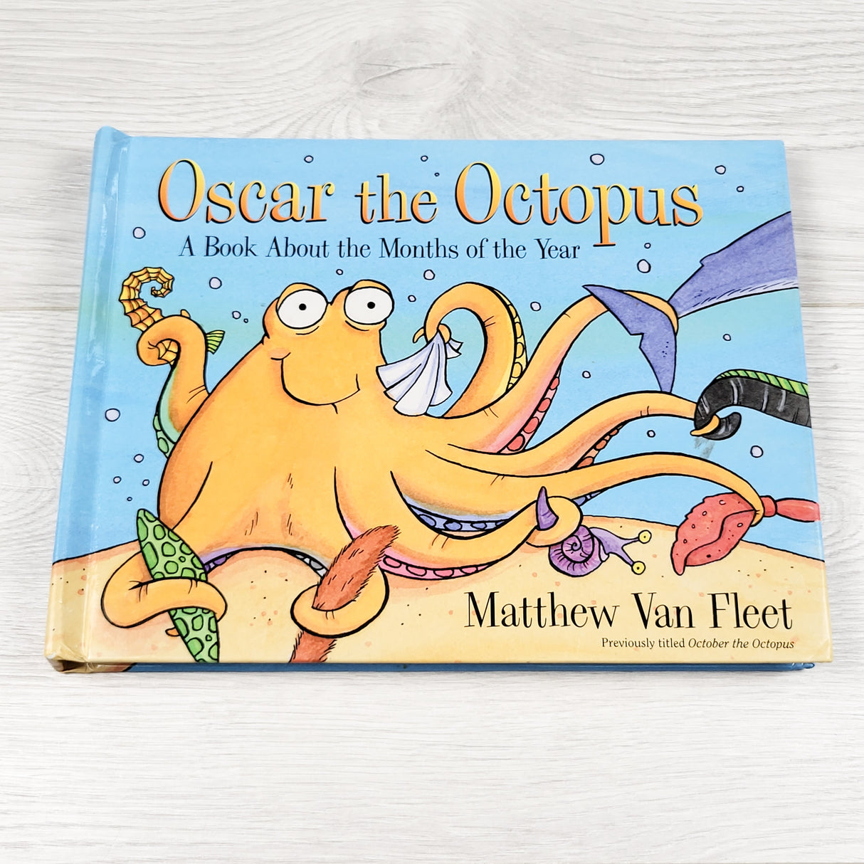 Oscar the Octopus: A Book About Months of the Year. Lift the flap board book