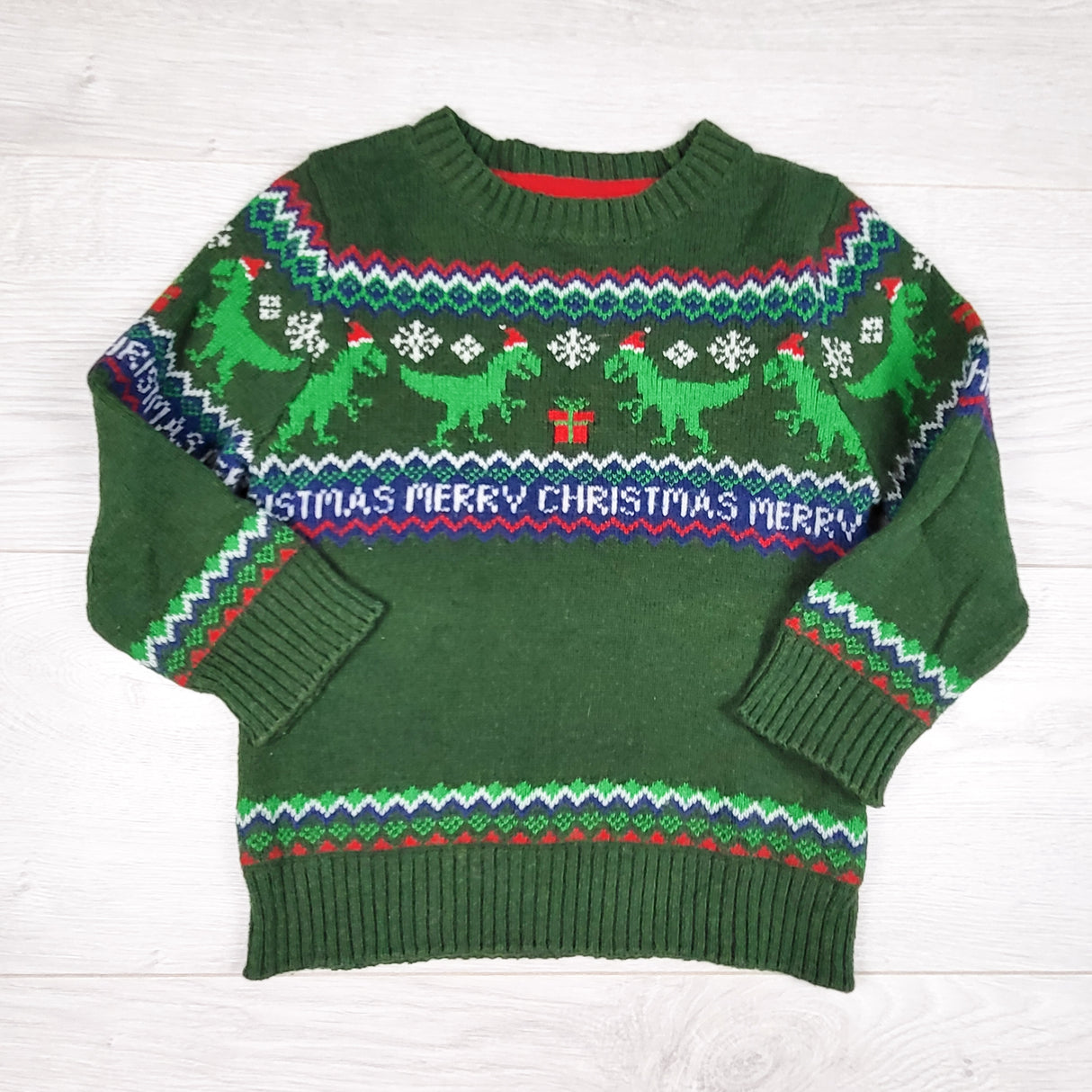 L.O.G.G. (H and M) green sweater with Christmas dinosaurs. Size 18-24 months