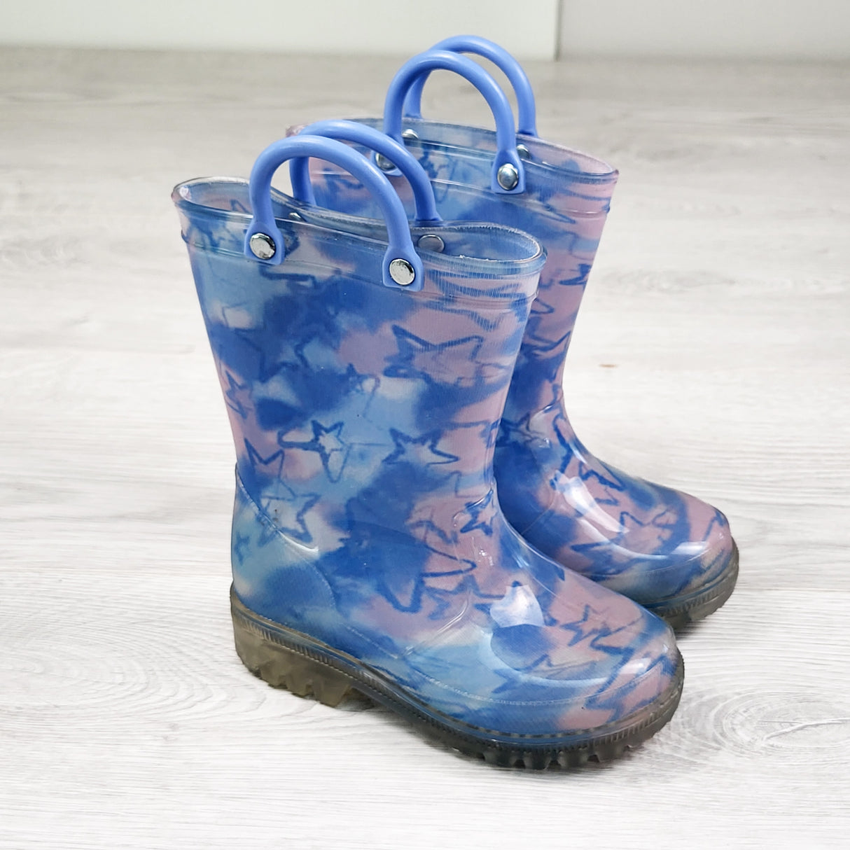 White Mountain blue and pink light up rain boots with stars. Size 7