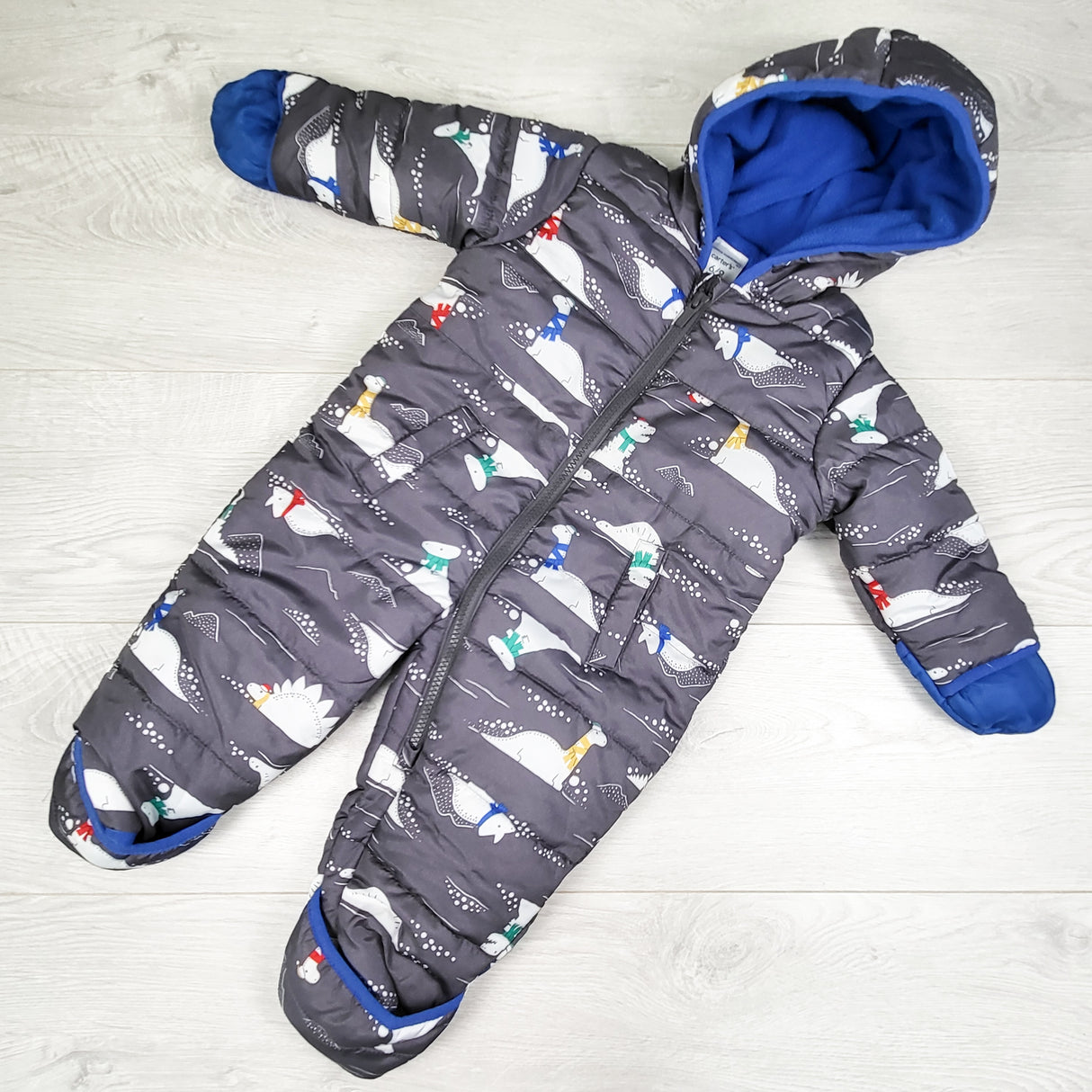 Carters grey fleece lined snow suit with dinosaurs. Size 6-9 months