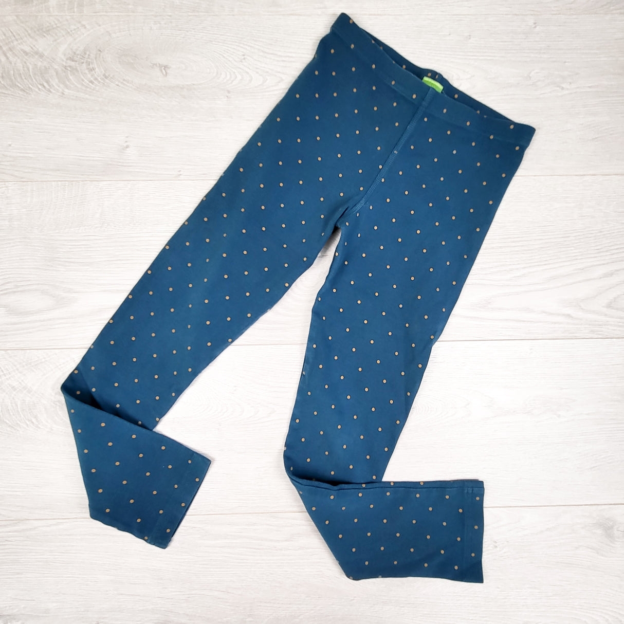 Peekaboo Beans teal and gold polka dot leggings. Size 8