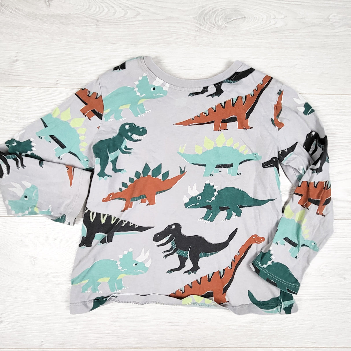 H and M grey dinosaur print long sleeve top. Size 4-6 Years