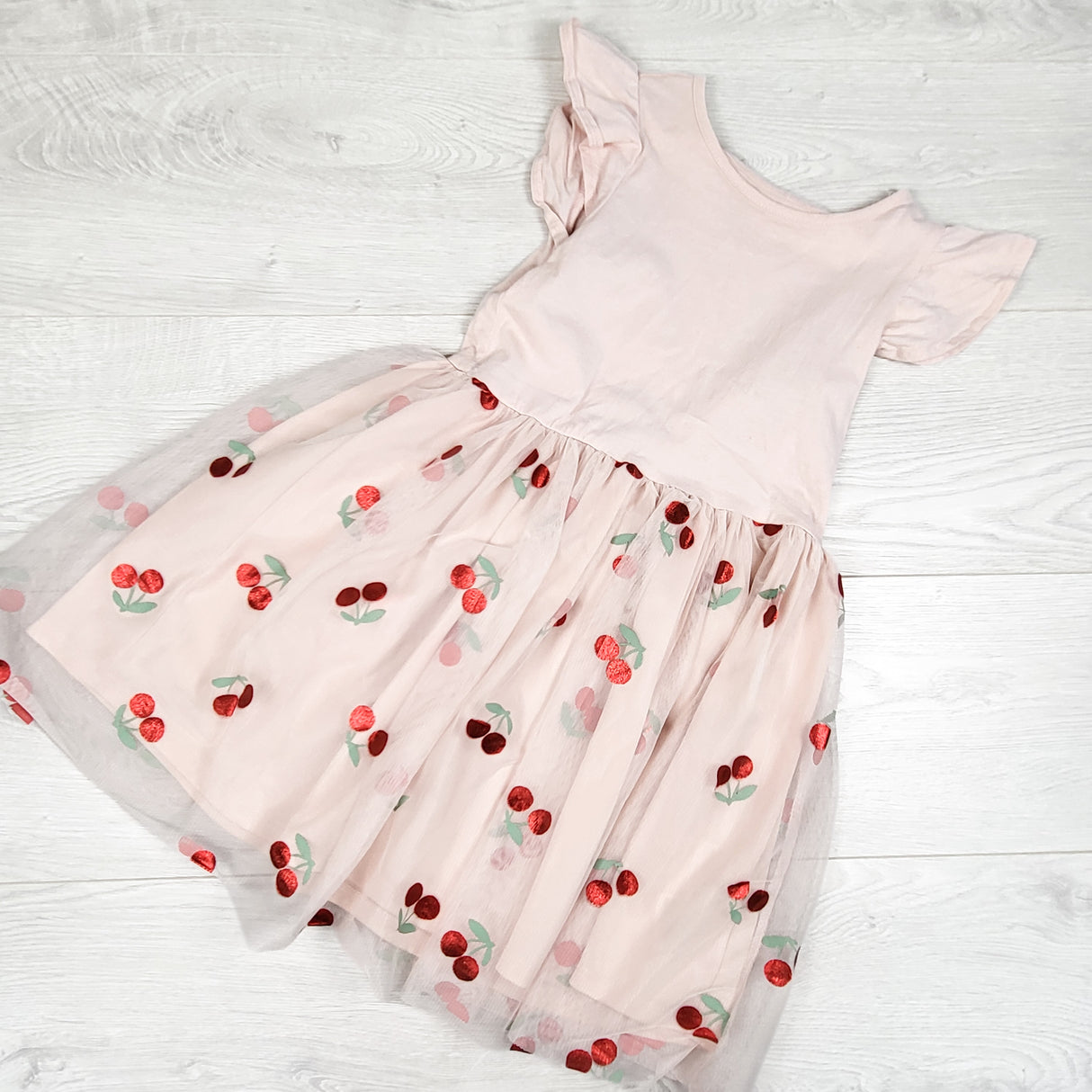 H and M pink dress with cherry print tulle skirting. Size 4-6 Years
