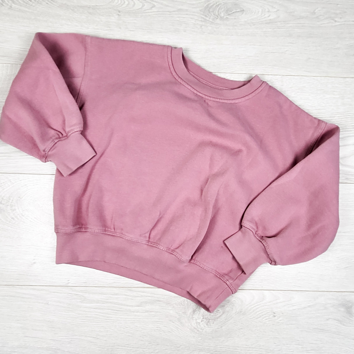Pink fleecy lined sweatshirt. Size 6