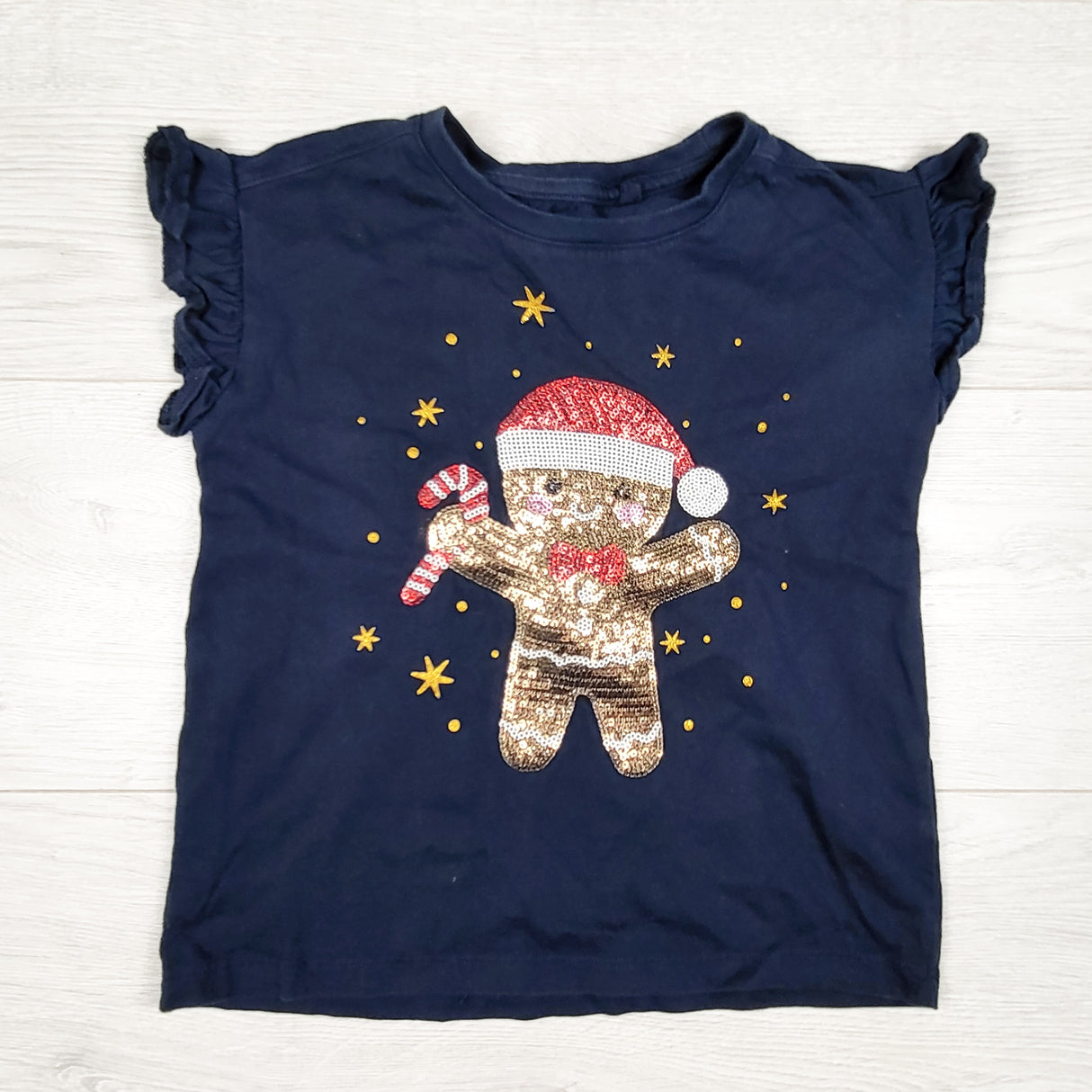 Anko navy t-shirt with sequin gingerbread man. Size 6