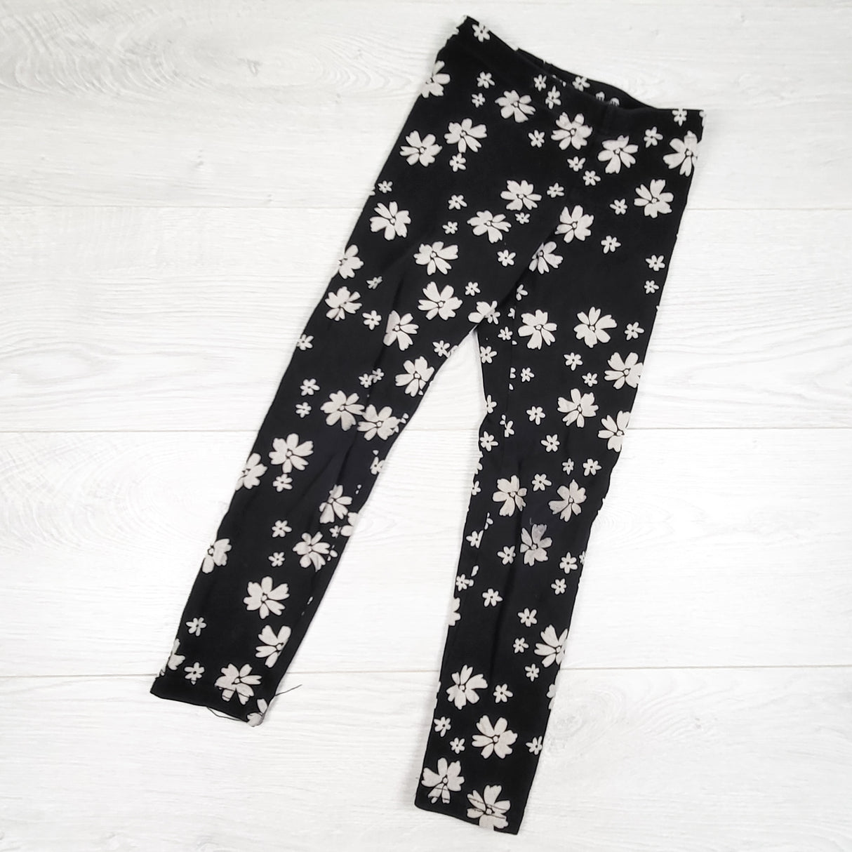 Old Navy black floral print leggings. Size 6/7