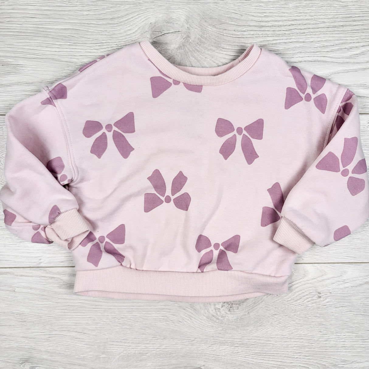 George pink sweatshirt with bows. Size 2T