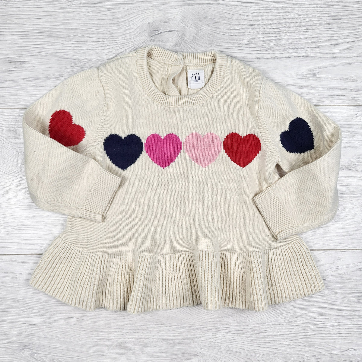 Gap beige peplum sweater with hearts. Size 18-24 months