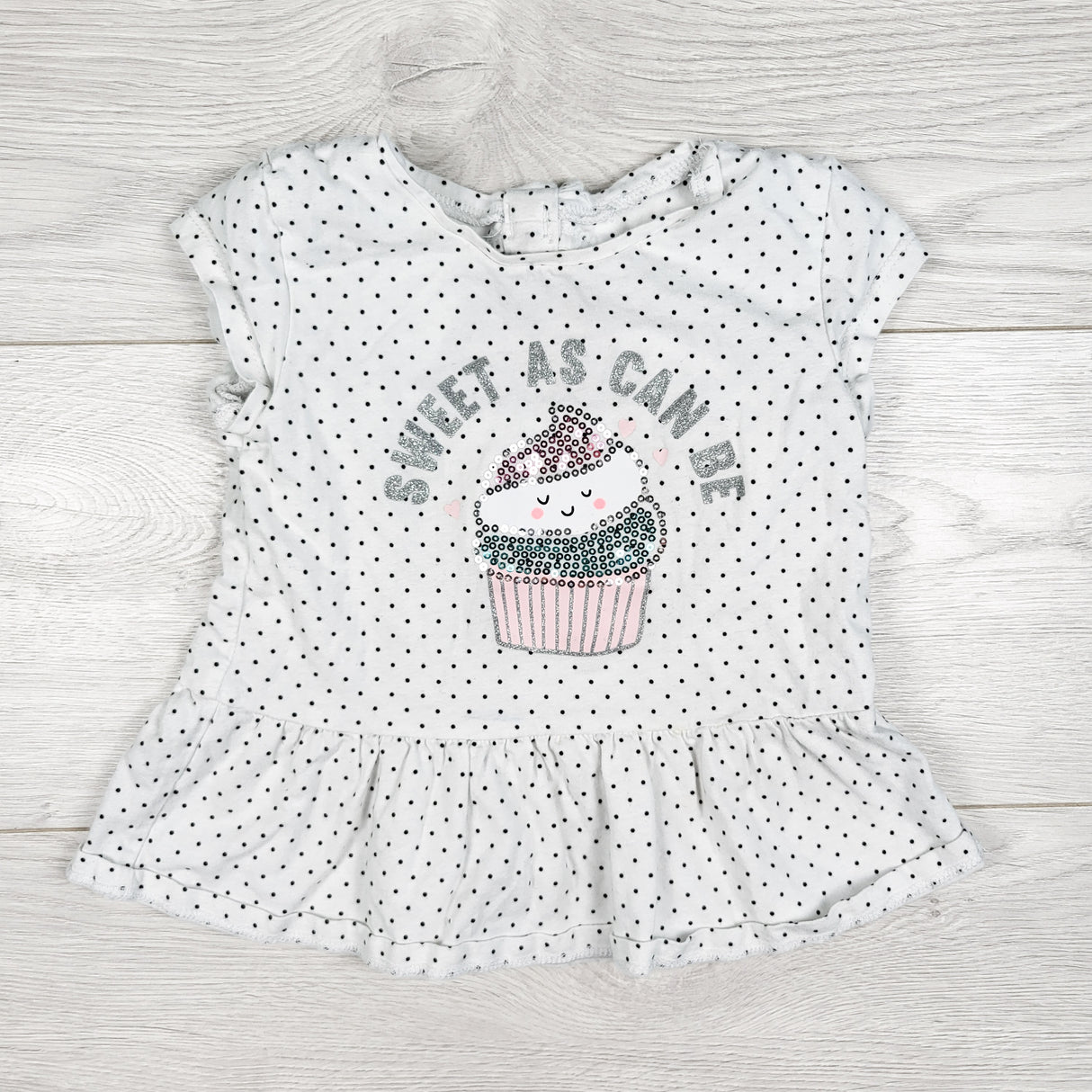 Carters white polka dot top with sequin cupcake. Size 24 months
