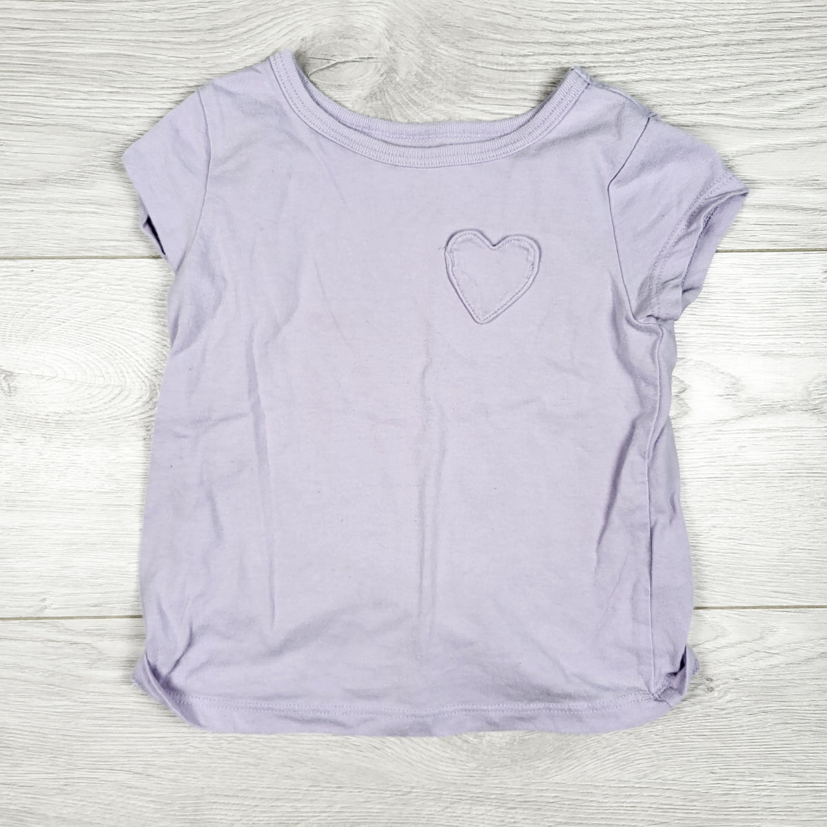 Carters pale purple t-shirt with heart pocket. Size 24 months